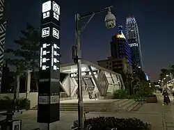 Вход на станцию Синьминь Лу