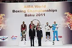 Евгений Котов со своим воспитанником Магомедрасулом Меджидовым на церемонии награждения победителей ЧМ по боксу 2011 года в Баку