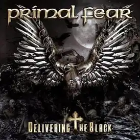 Обложка альбома Primal Fear «Delivering the Black» (2014)