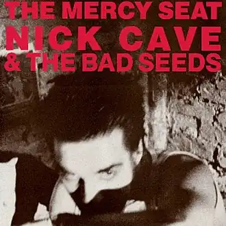 Обложка сингла группы Nick Cave and the Bad Seeds «The Mercy Seat» (1988)