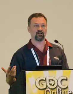 Тим Кейн на конференции GDC Online, 2010
